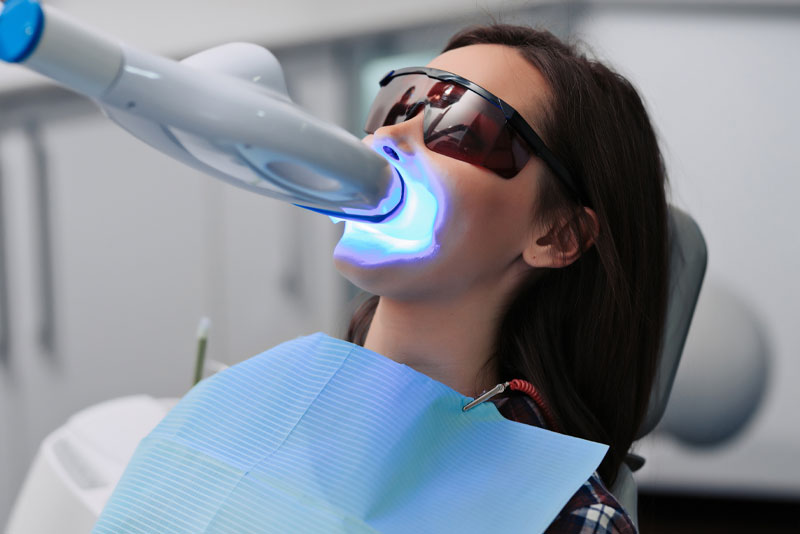 dental patient undergoing teeth whitening procedure