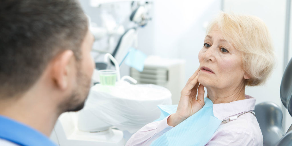 dental patient with painful dentures