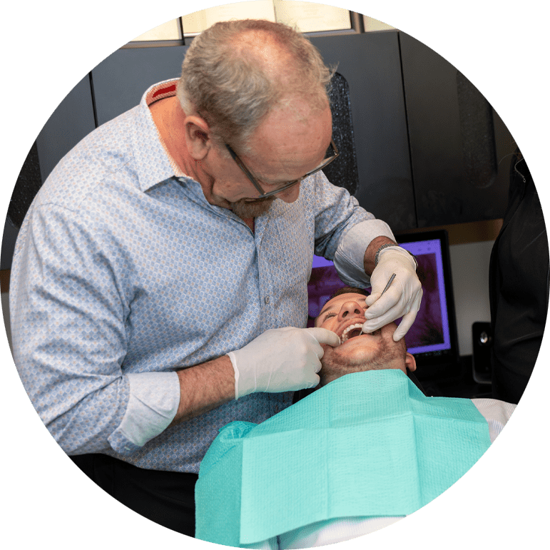 dr leedy performing root canal procedure