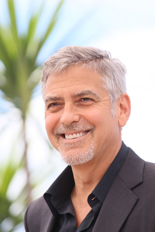 George Clooney Smiling During A Vacation That He Took After His Dental Implant Procedure