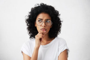 Questioning Dental Patient Wondering About If Dental Implants Are Right For Her