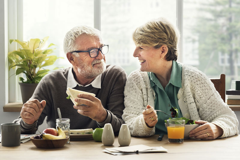 Dental Implant Patients Eating Together In Abilene, TX