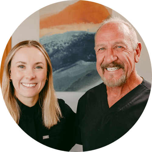 Doctor Smiling with Team member