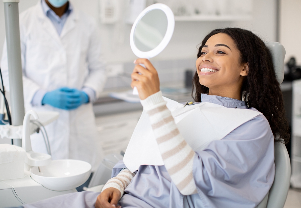 Dentist consulting with a patient in a modern Abilene clinic